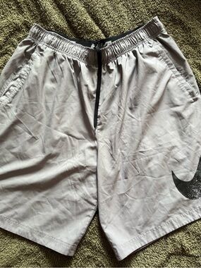 Nike Men's Light Gray Athletic Shorts with Black Drawstring